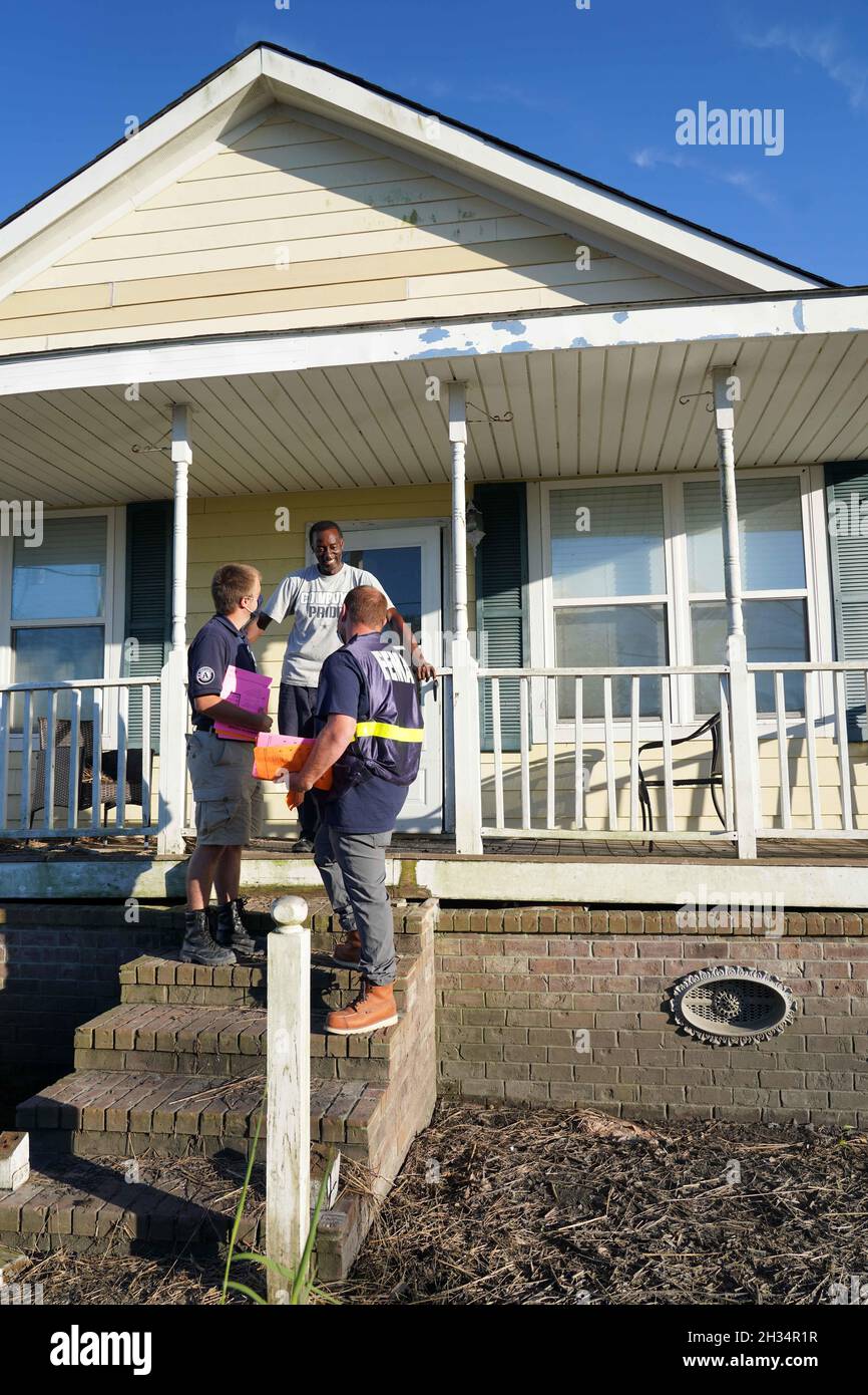 Ironton, United States of America. 24 September, 2021. FEMA Disaster Survivor Assistance staff walking door to door registering and answering questions for residents of the historically underserved communities in the aftermath of Hurricane Ida September 24, 2021 in Ironton, Louisiana. Credit: Julie Joseph/FEMA/Alamy Live News Stock Photo