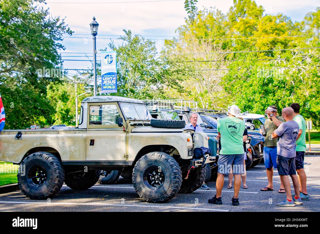 Car enthusiasts discuss a 1966 Land Rover Series IIA 109 two-door pickup at the 31st annual British Car Festival, Oct. 24, 2021, in Fairhope, Alabama. Stock Photo