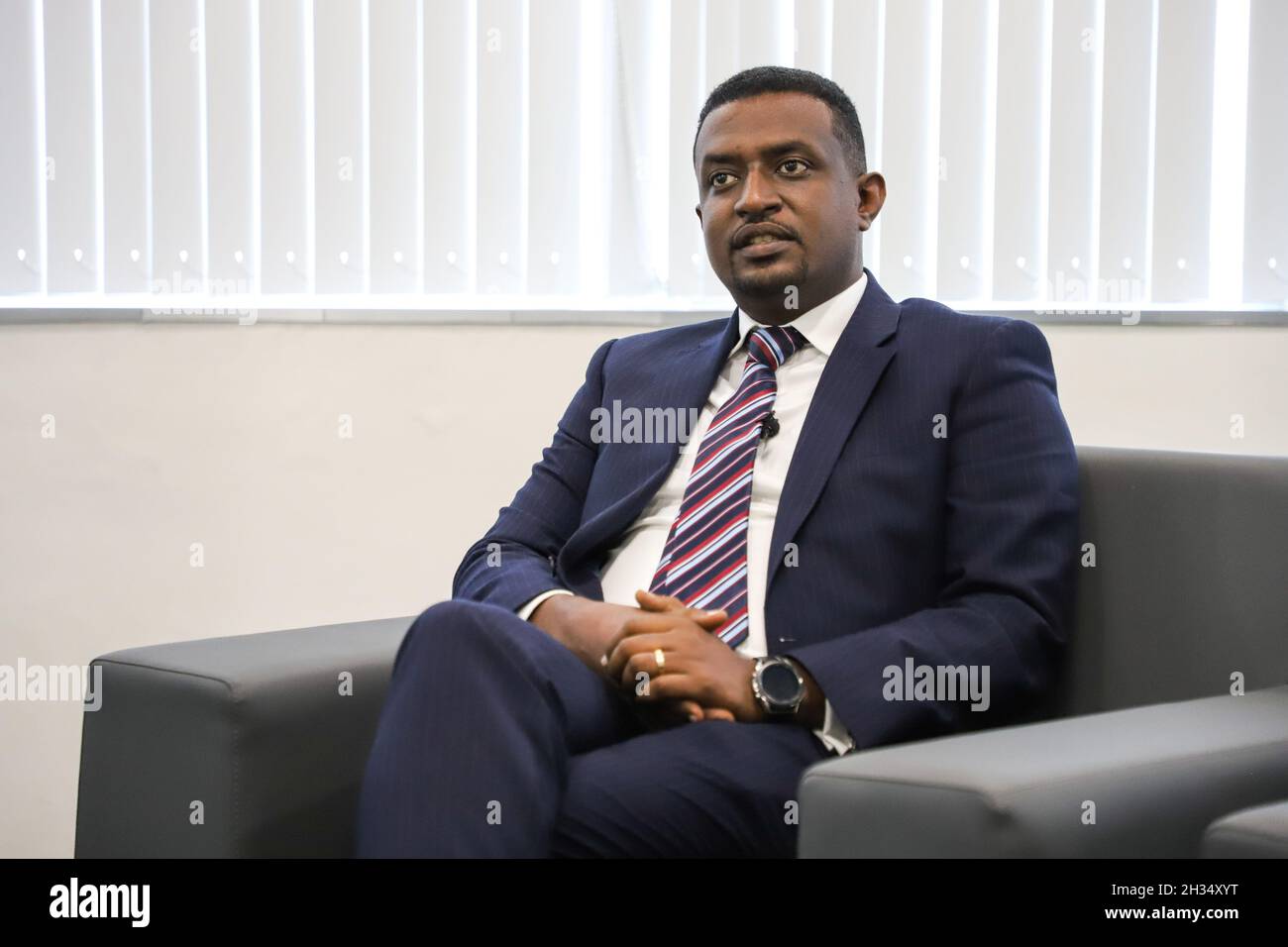 Addis Ababa, Ethiopia. 14th Oct, 2021. Israel Degfa, the CEO of Kerchanshe Trading Private Limited Company (PLC), speaks during an interview with Xinhua in Addis Ababa, Ethiopia, on Oct. 14, 2021. Kerchanshe Trading Private Limited Company (PLC), the largest producer and exporter of coffee in Ethiopia, says the upcoming 4th China International Import Expo (CIIE) will create a huge opportunity for coffee-producing and exporting companies. Credit: Michael Tewelde/Xinhua/Alamy Live News Stock Photo