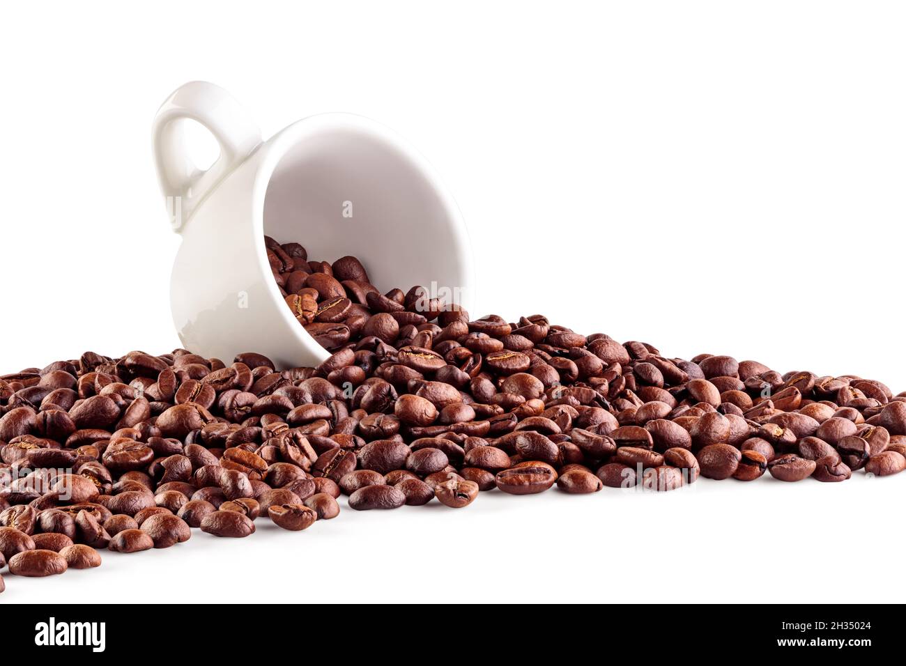 White cup with coffee beans Stock Photo