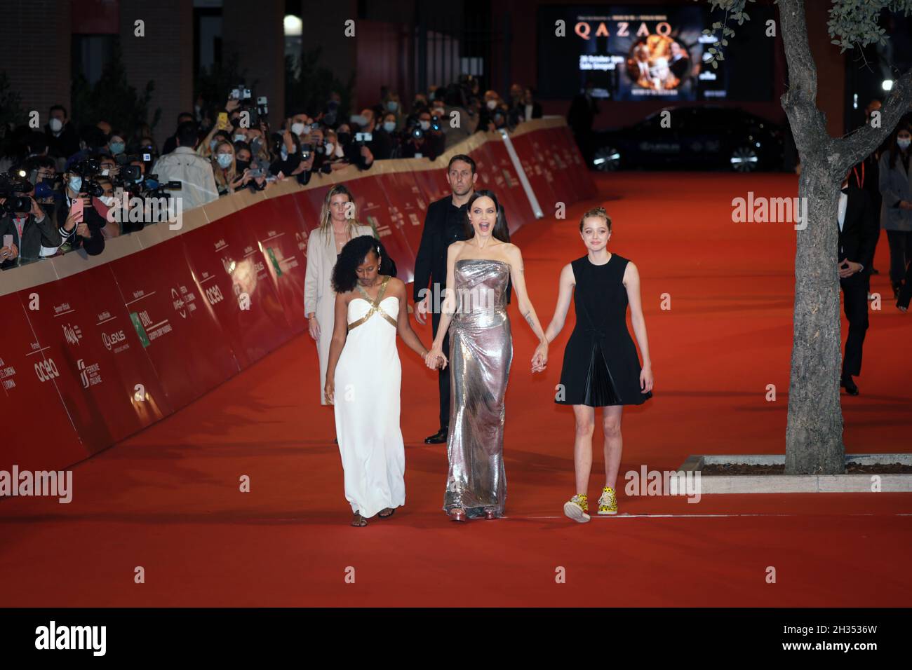 ROME, ITALY - OCTOBER 24: (L-R) Zahara Marley Jolie-Pitt, Angelina Jolie and Shiloh Jolie-Pitt attend the red carpet of the movie 'Eternals' during the 16th Rome Film Fest 2021. Stock Photo