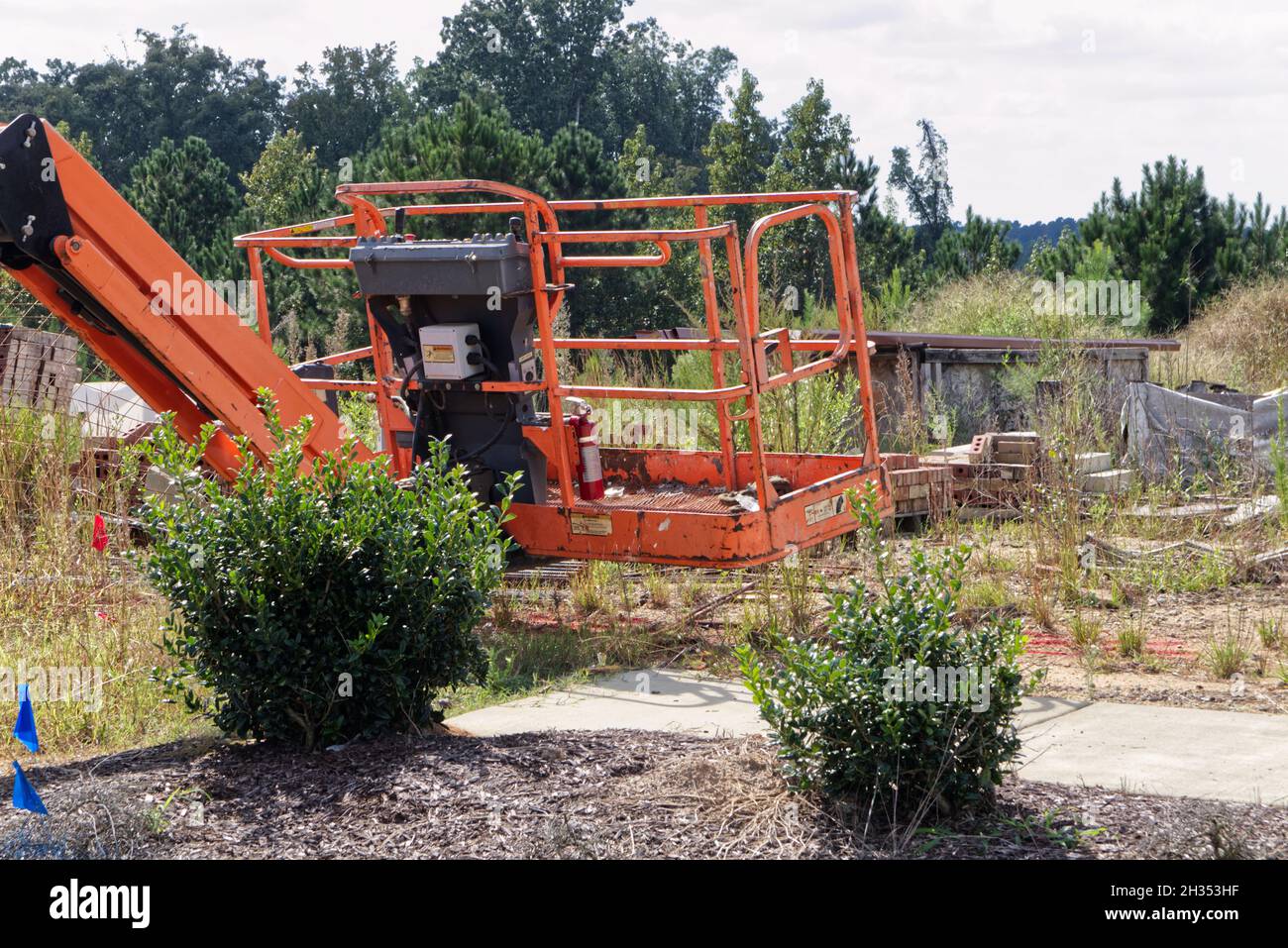 Grovetown, Ga USA - 10 14 21: Orange bucket lift for construction work Stock Photo