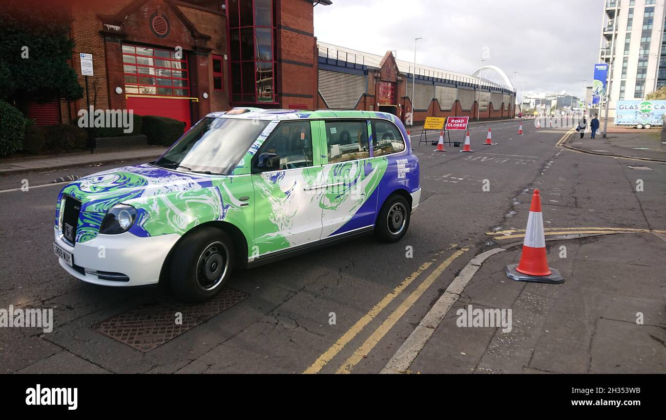 COP26 Glasgow Taxi With Logo Wrap Stock Photo Alamy