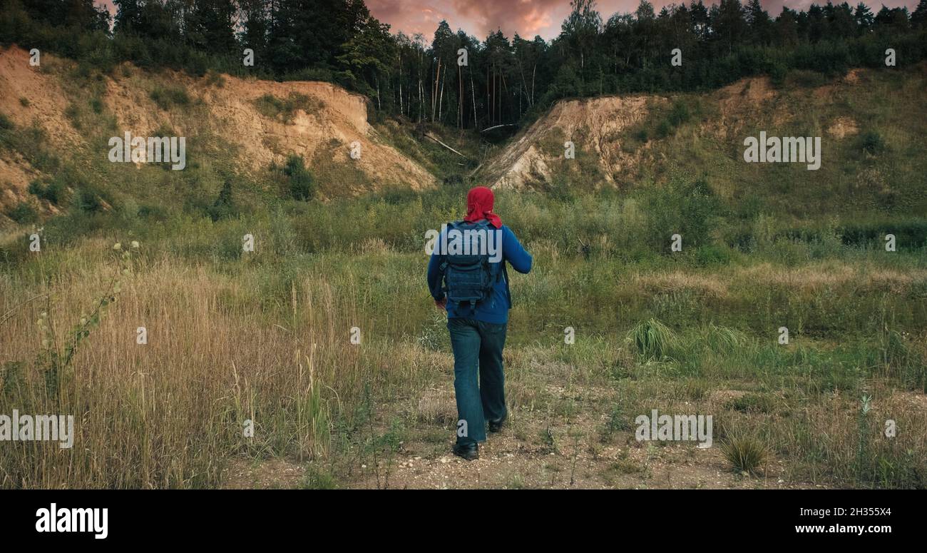 Active man large backpack walks hi-res stock photography and images - Alamy