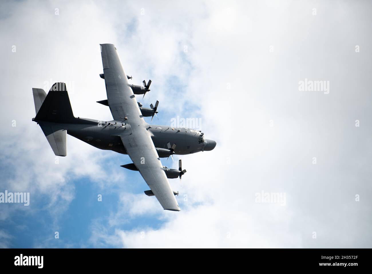 An MC-130H Combat Talon II Aircraft flies over the Hurlburt Field, Florida flightline as they return from a deployment Oct. 6, 2021. Two MC-130H Combat Talon II aircraft crews returned from a deployment to see their families waiting on the flightline. (U.S. Air Force photo by Staff Sgt. Rito Smith) Stock Photo