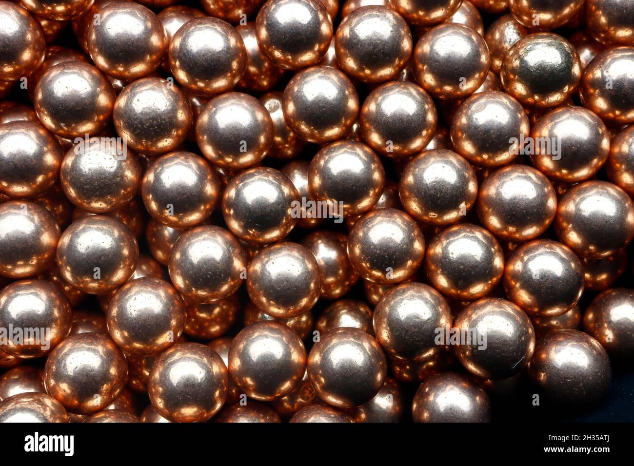 Shiny spherical copper Ball bearings Stock Photo