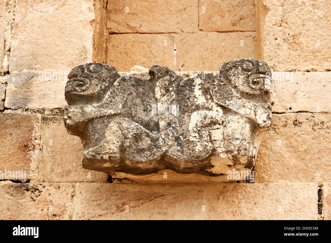 Two-headed jaguar sculpture on the wall of the  Nunnery Quadrangle, Uxmal, Yucatan, Mexico Stock Photo