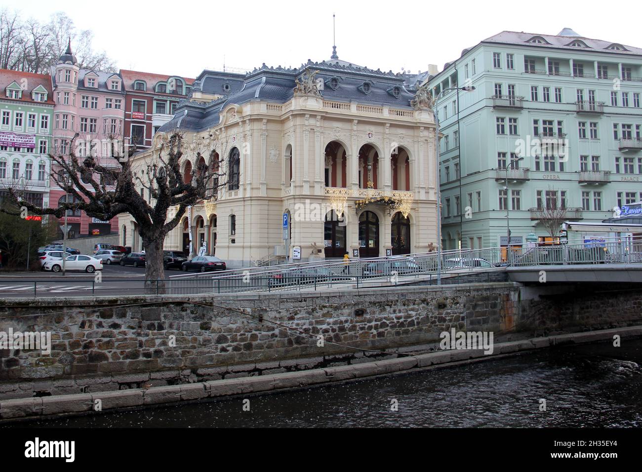 City Theater, view across the Tepla River in the evening, Karlovy Vary, Czech Republic Stock Photo