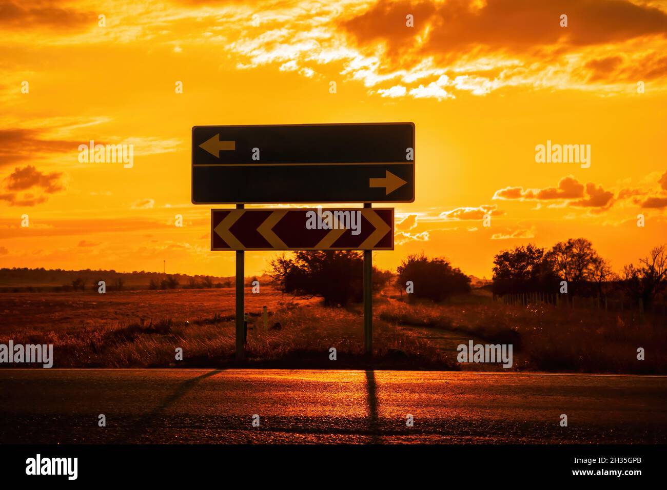 Empty blue direction crossroads road signs representing oportunities ...