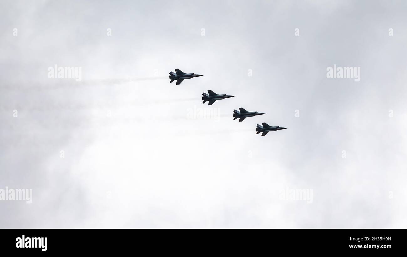 Moscow, Russia - May, 05, 2021: Four MIG-31K, Foxhound, with Kh-47M2 Kinzhal missle flying over Red Square during the preparation of the May 9 parade. Stock Photo