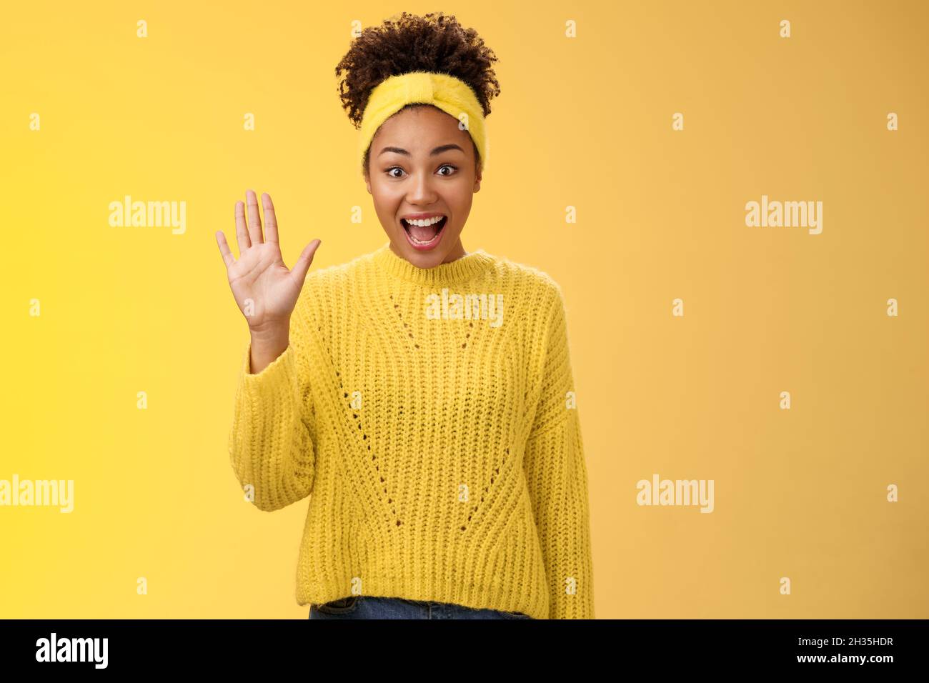Portrait african woman waving welcoming hi-res stock photography and ...