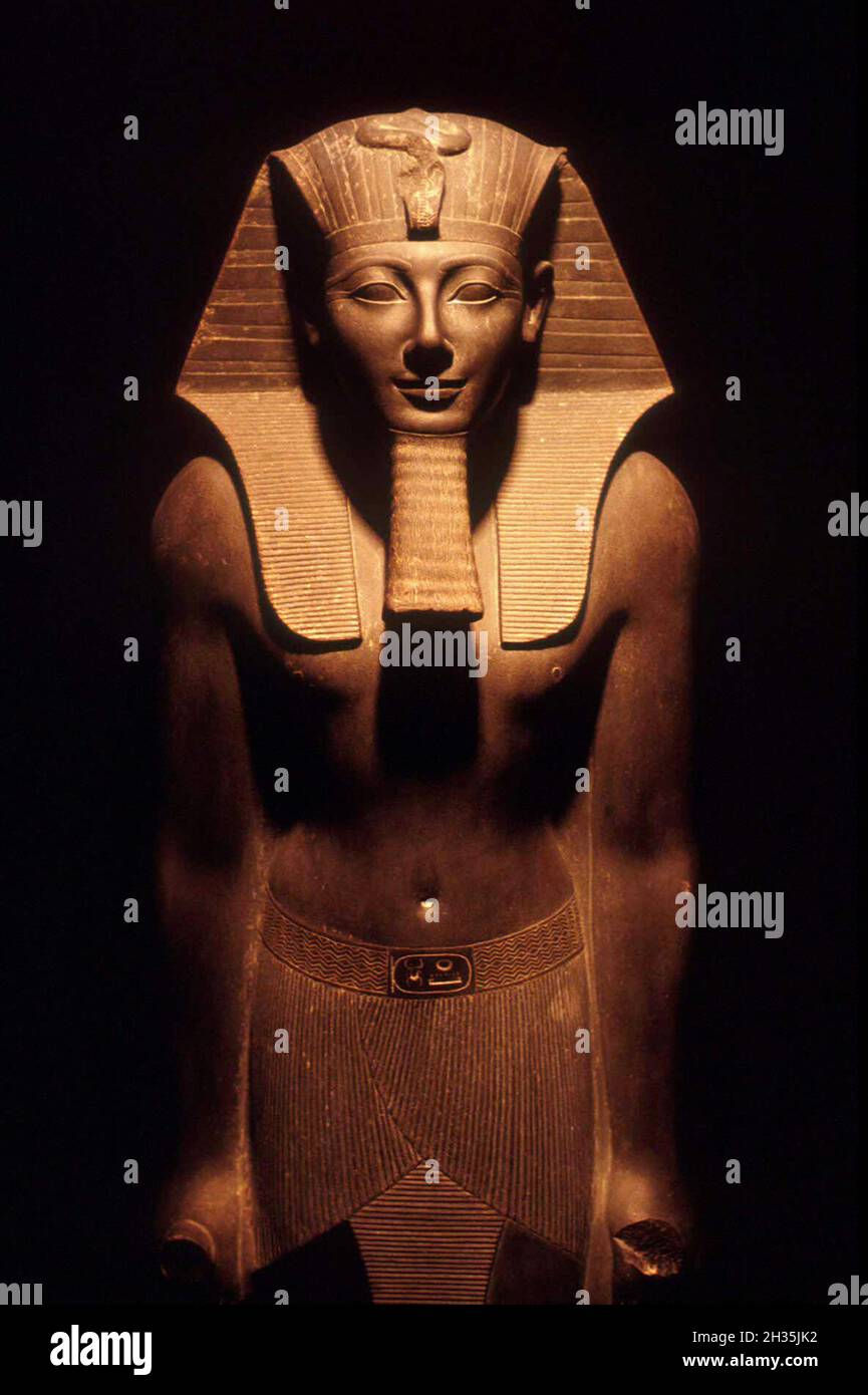 Pharaoh Tuthmosis III basalt statue, Luxor Museum, Luxor, Egypt Stock Photo