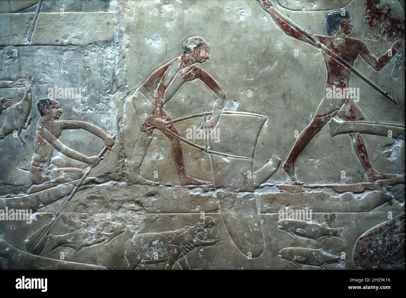 Colored relief of fishing inside tomb of Princess Idut, Old Kingdom, 6th Dynasty, Saqqara, south Cairo, Egypt Stock Photo