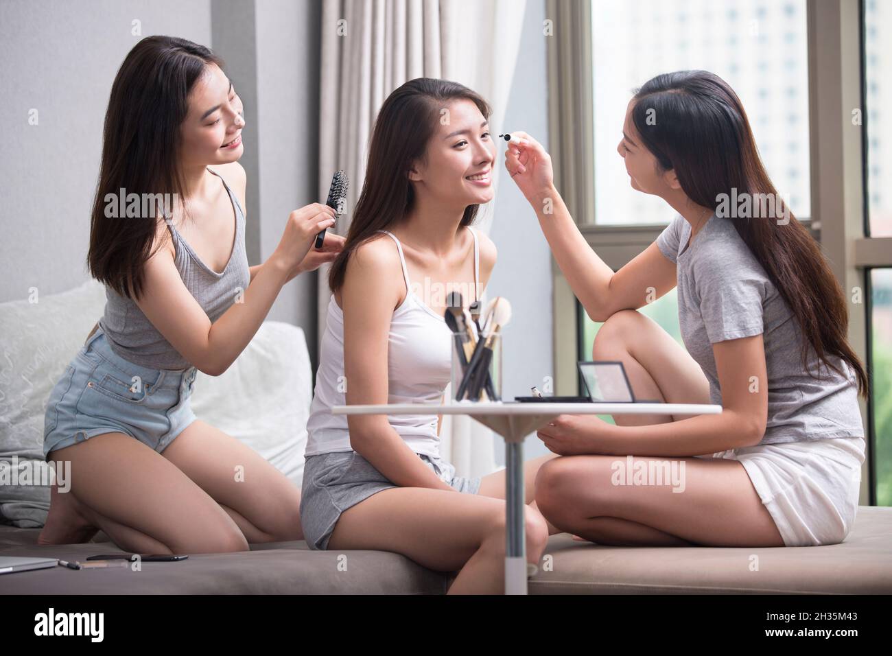 Three best friends making up together Stock Photo Alamy