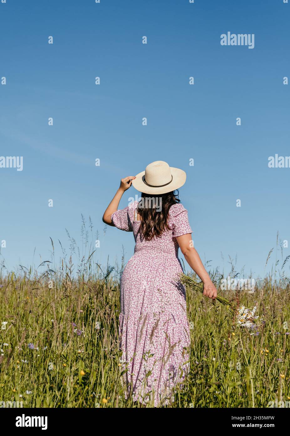 Woman with long dress hi-res stock photography and images - Alamy