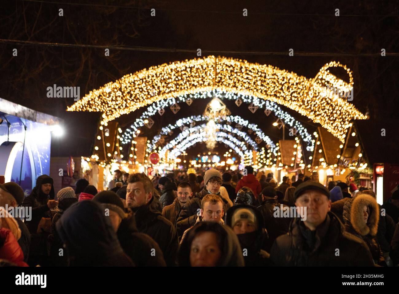 Lviv, Ukraine - January 3, 2021: overhead view of people walking by christmas fair copy space Stock Photo