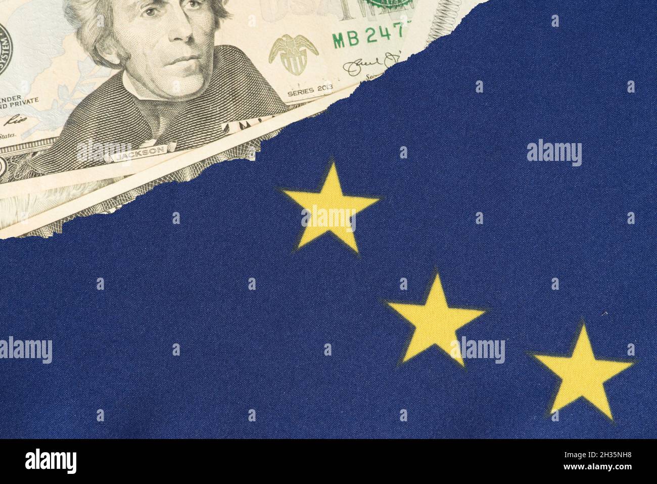 European Union flag and dollar banknotes Stock Photo