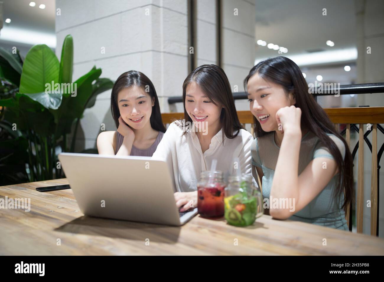 Three best friends getting together Stock Photo