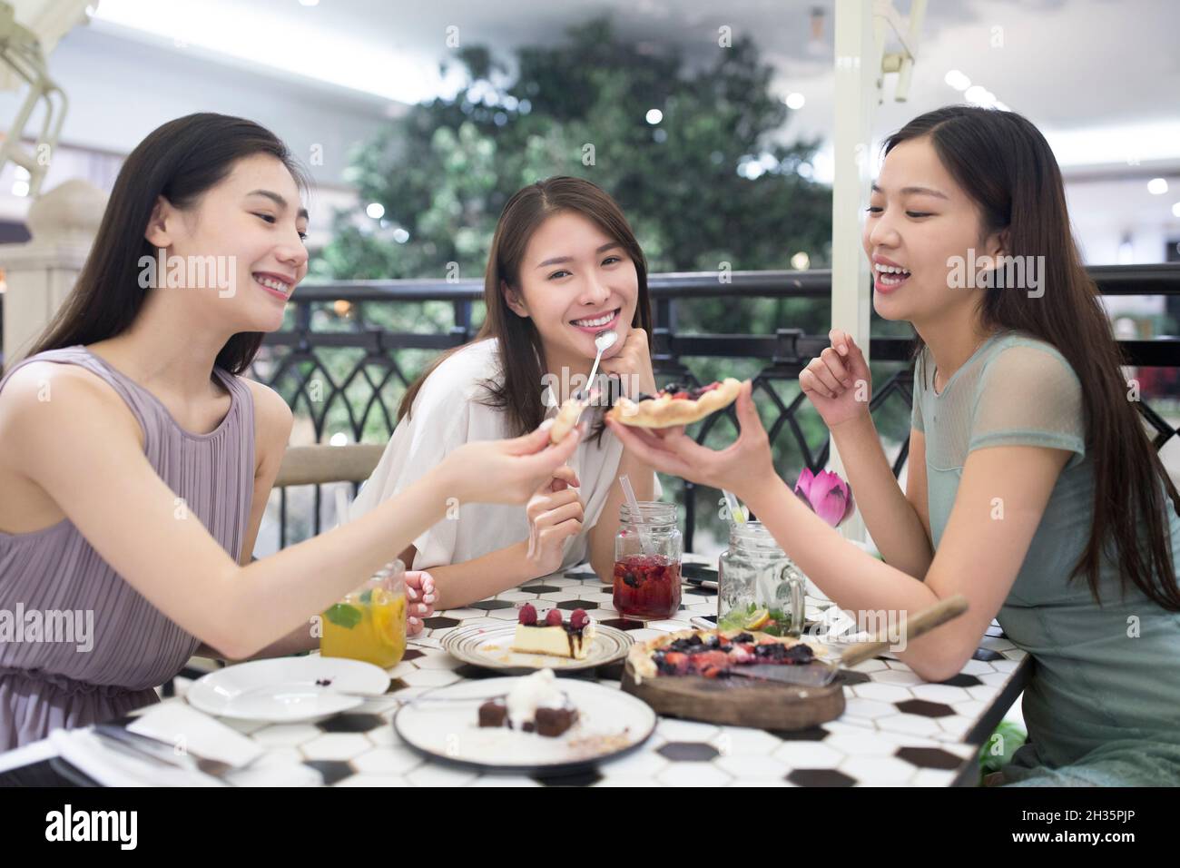 Three best friends getting together Stock Photo Alamy
