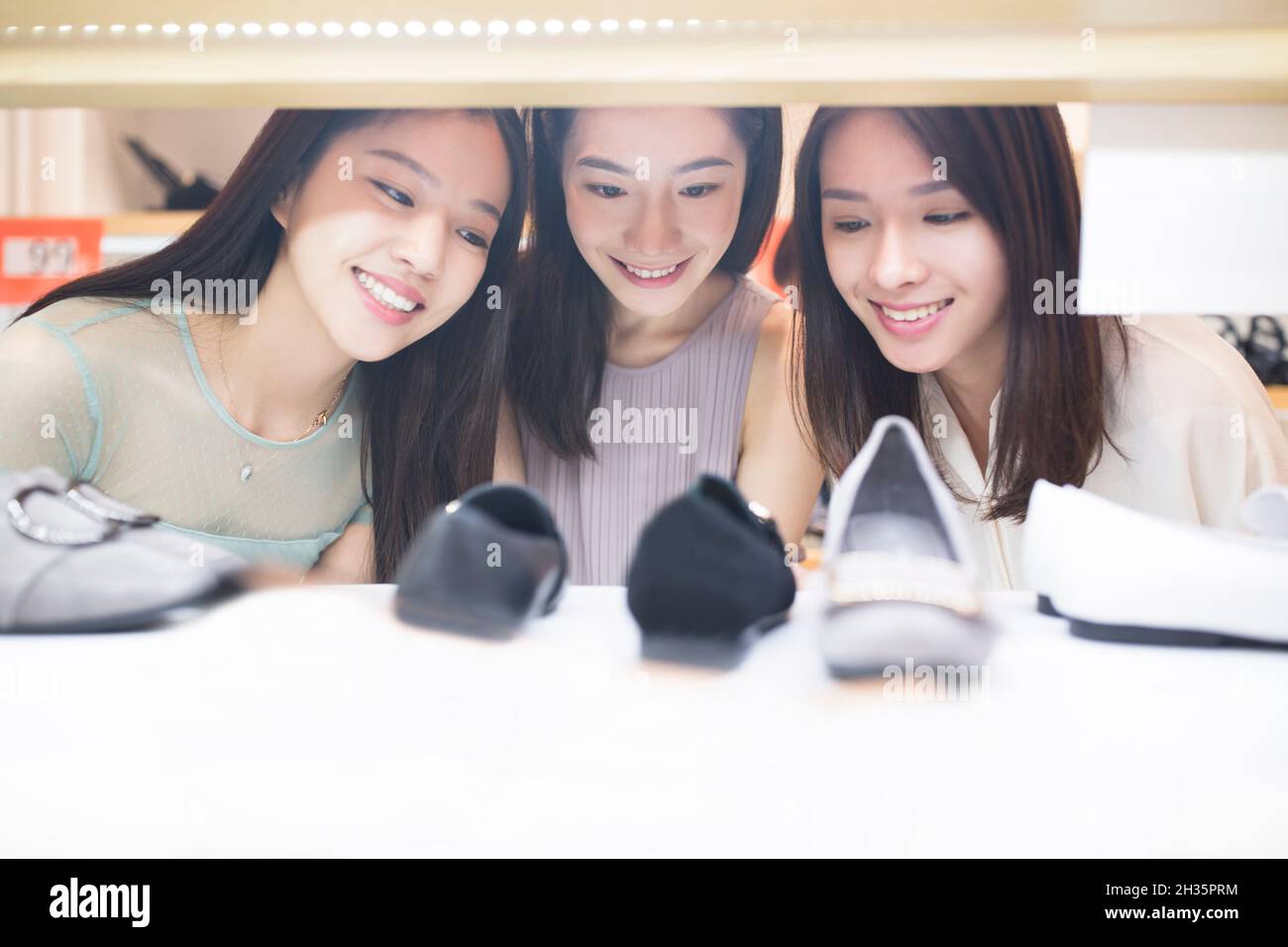 Three best friends going shopping together Stock Photo Alamy