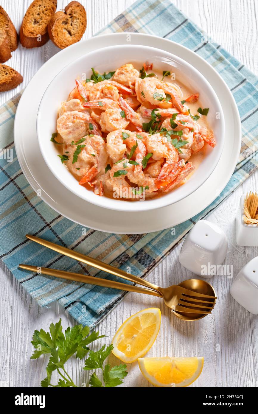 prawns cooked in rich, creamy Alfredo sauce with grated parmesan cheese