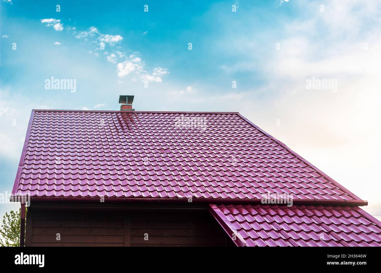 Blue metal tile roof hi-res stock photography and images - Alamy