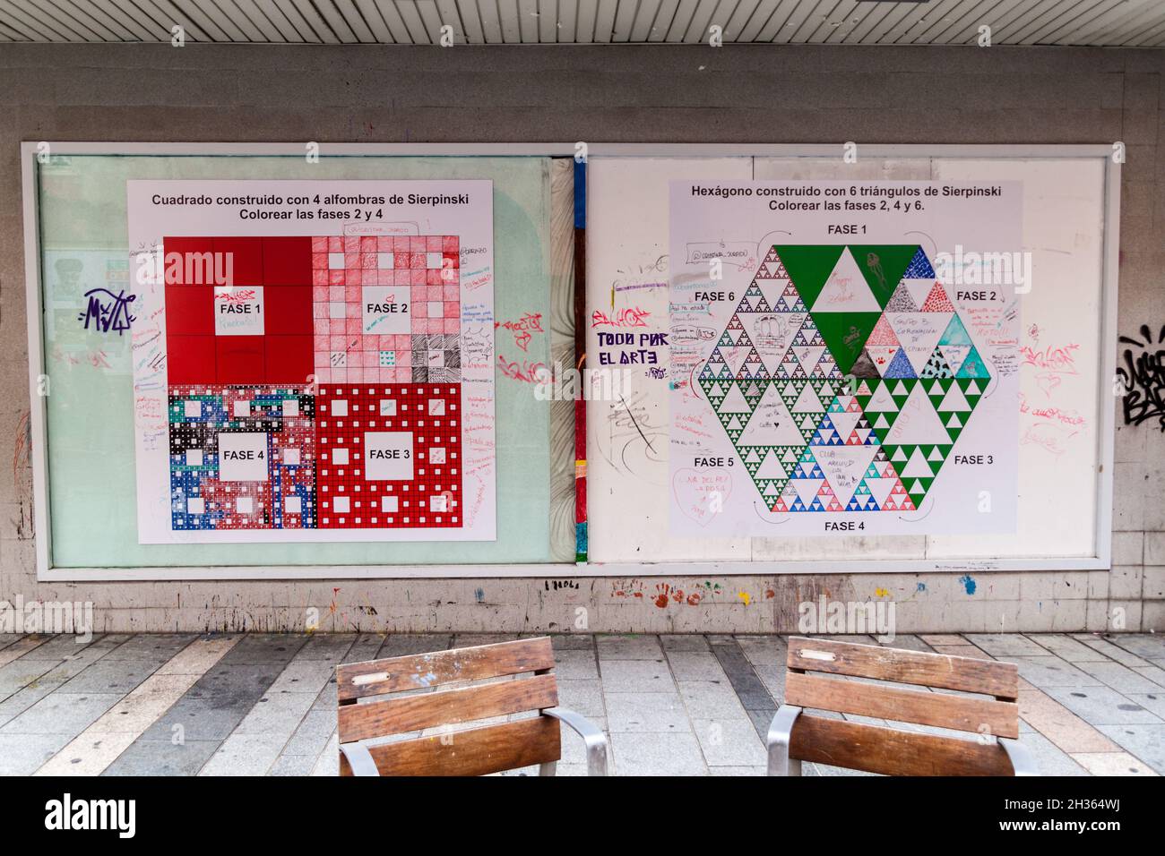 CORDOBA, SPAIN - NOVEMBER 4, 2017: Wall with posters of Sierpinski carpets and triangles fractal in Cordoba, Spain Stock Photo