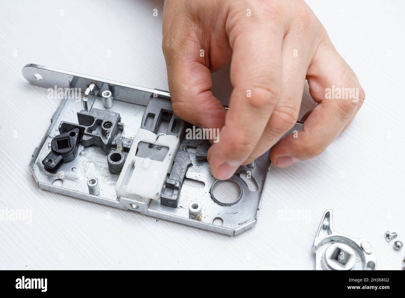 the latch in the door lock is broken. the lock was dismantled