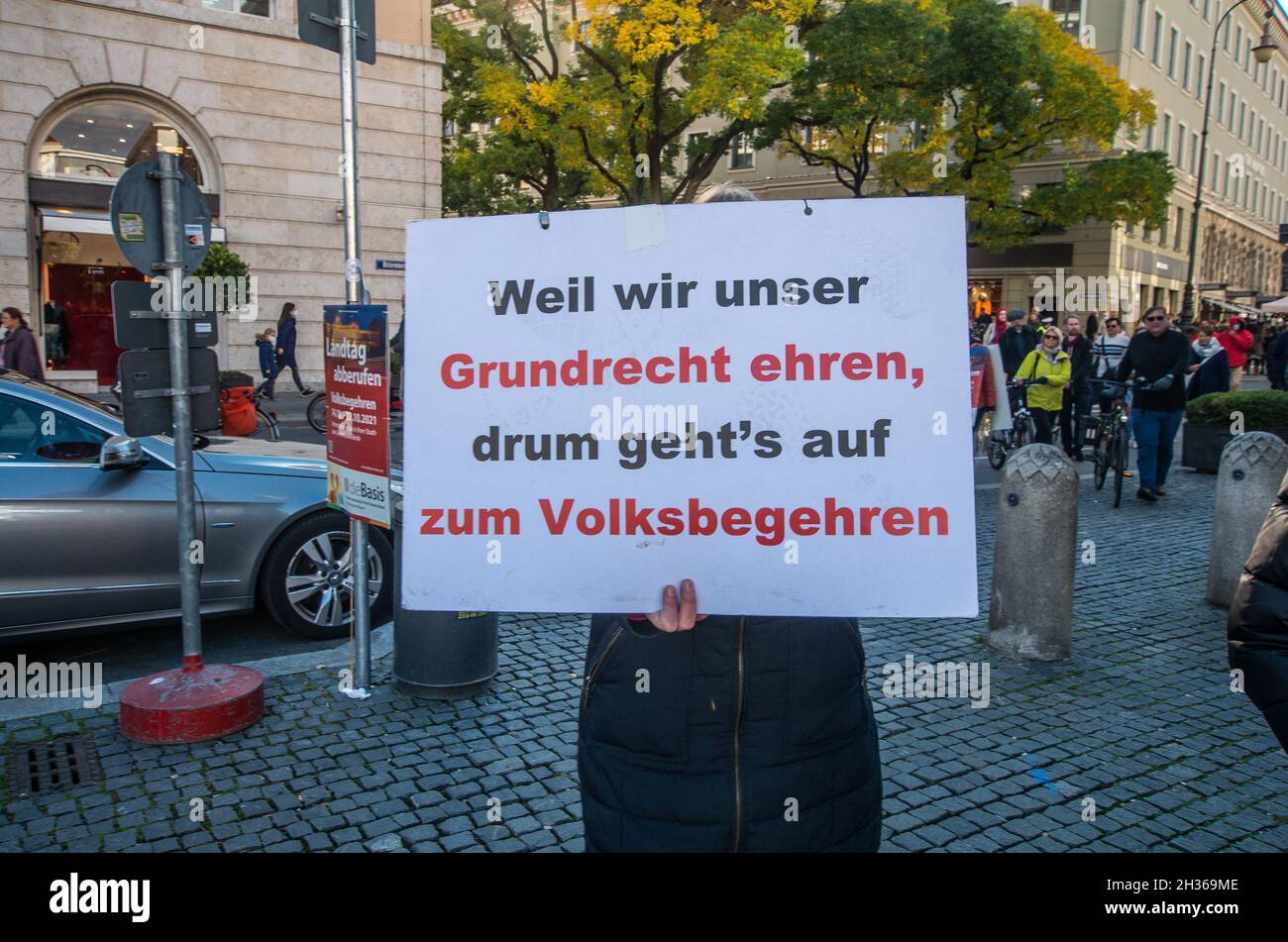 Munich, Bavaria, Germany. 23rd Oct, 2021. Signs and supporters of the Volksbegehren Landtag Abberufen (initiative to recall the Bavarian Parliament) during an anti-mask, Corona denier demonstration. The composition and leadership of the initiative includes Querdenker, QAnons, die Basis, neonazis, Reichsbuerger (sovereign citizens), and known conspiracy theorists and wellness advocates. The goal is to topple the Bavarian government and install their own, presumably far-right, sovereign citizen government in its place. Thus far, the initiative in stage 2 has failed to receive much resonance Stock Photo