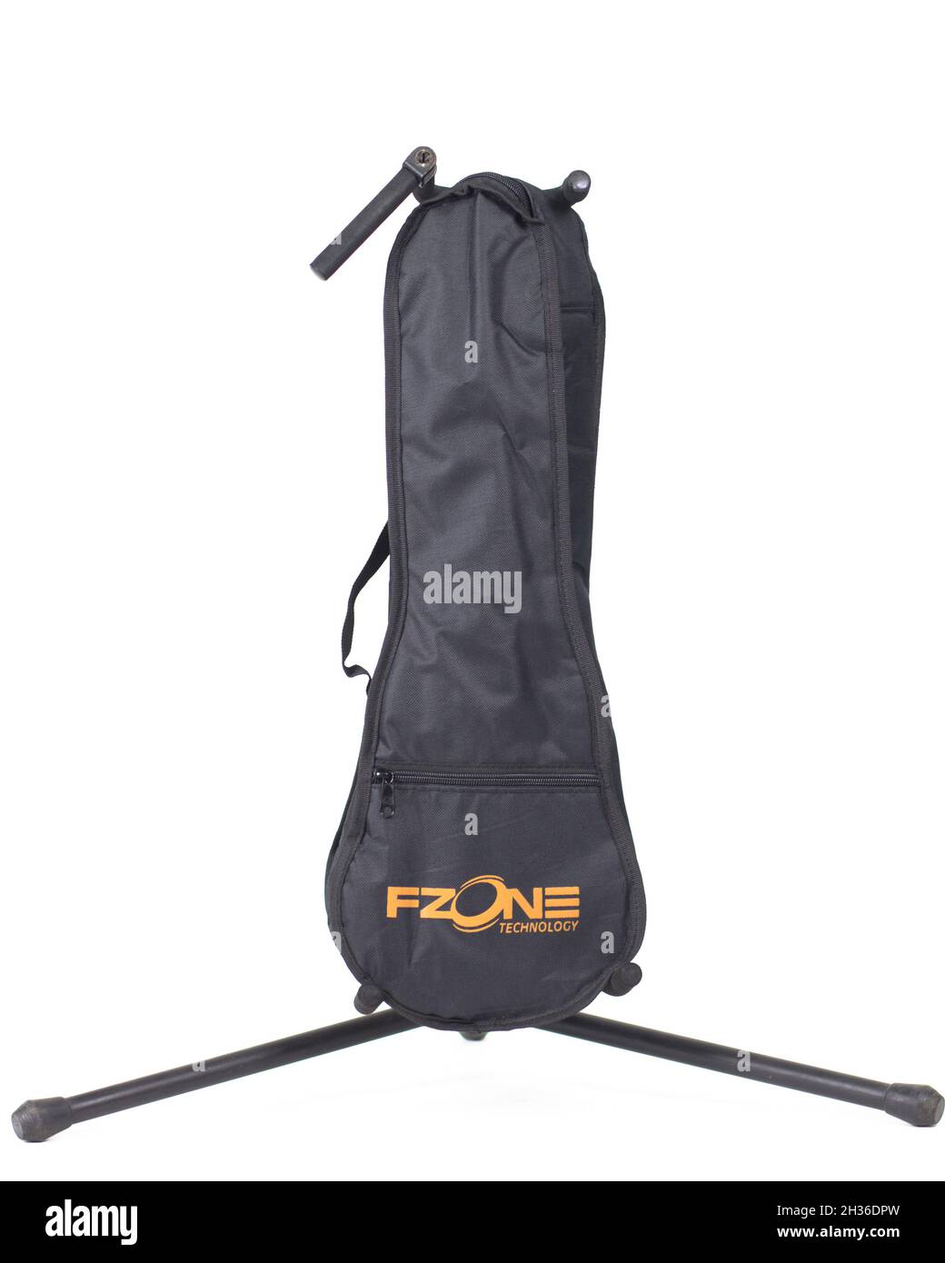 new guitar case in black on a white background Stock Photo - Alamy