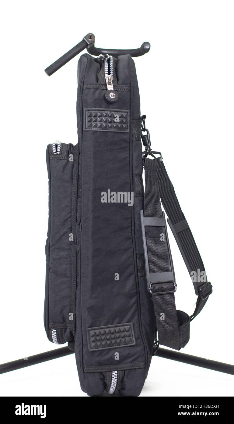 new guitar case in black on a white background Stock Photo - Alamy