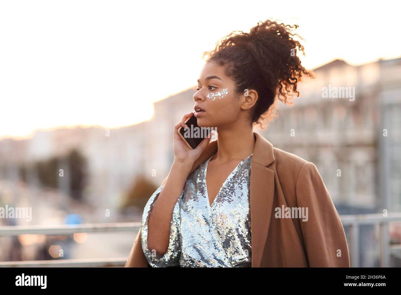 Louis vuitton silver sequin mini dress hi-res stock photography and images  - Alamy