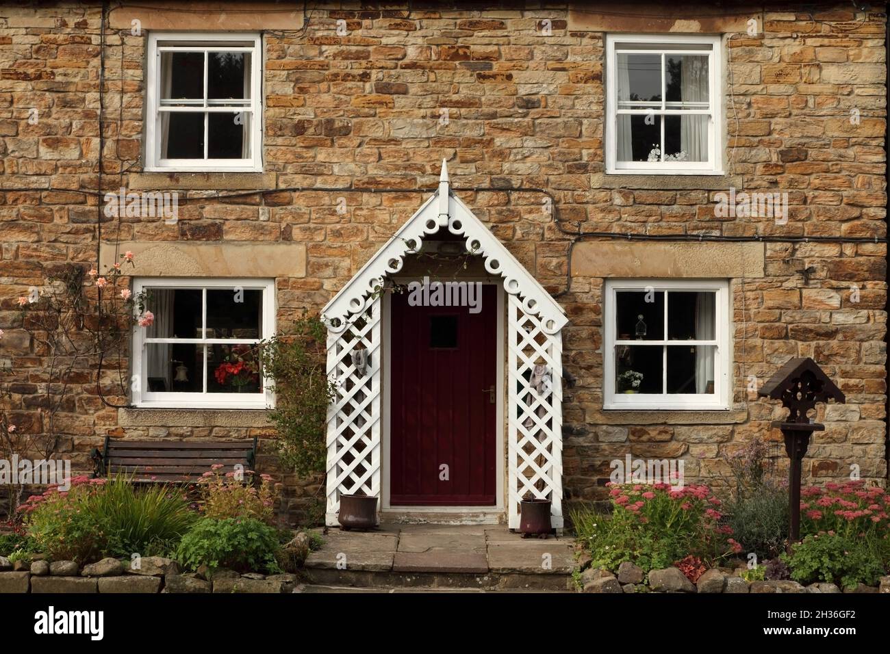 Traditional stone cottage with sash windows in Blanchland, Northumberland, UK, Stock Photo