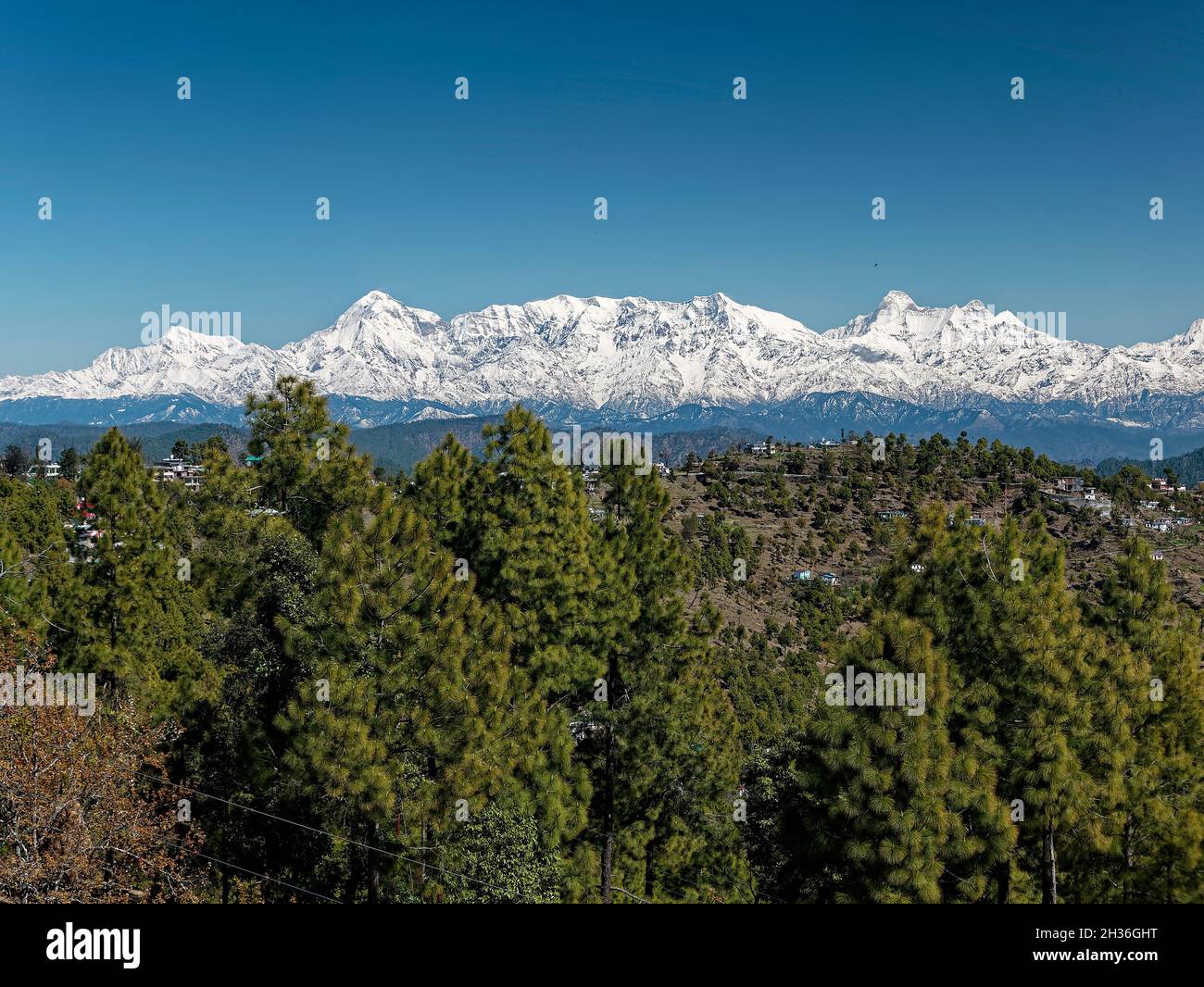 View of a snow caped Himalayan mountain ranges Stock Photo - Alamy