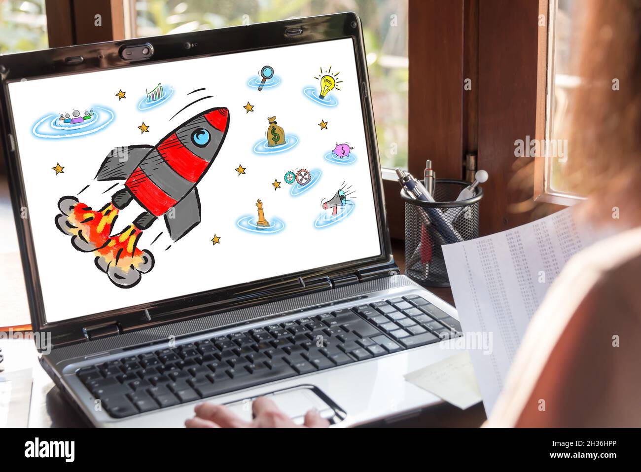 Laptop screen showing business success concept Stock Photo - Alamy