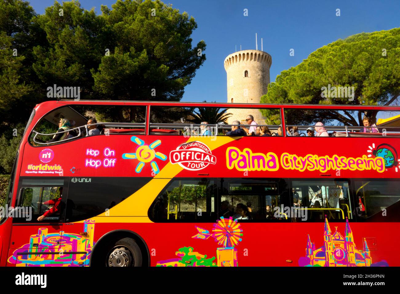Sightseeing Bus at Bellver Castle Palma de Mallorca Castell de Bellver, Spain Mallorca bus Stock Photo