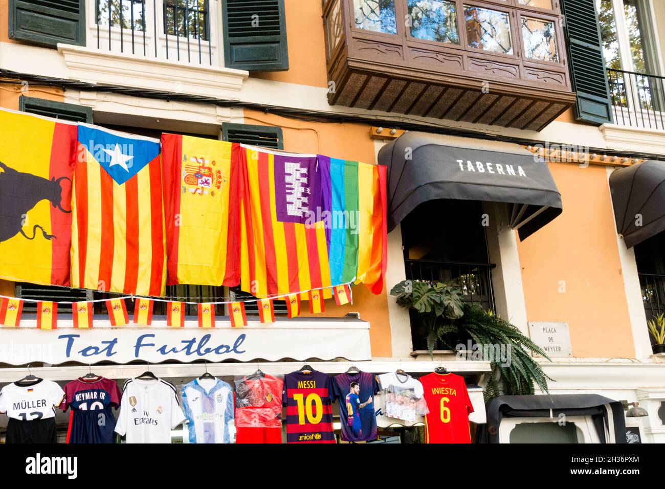 Europe Spain street Palma de Mallorca Old Town shop sell flags-everything for football, Stock Photo