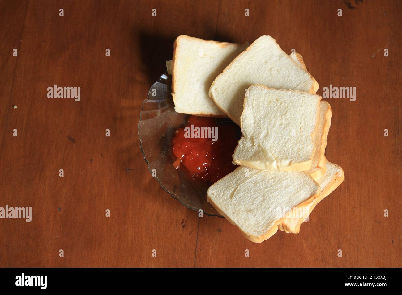 slices of fragrant white bread and fresh sauce for sandwiches, burgers, and more. Stock Photo