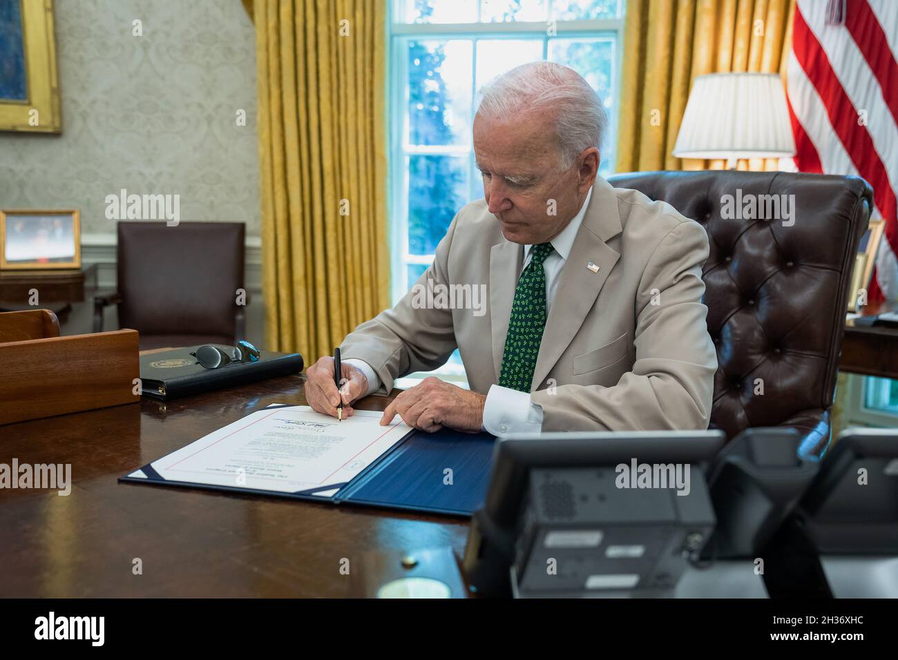 WASHIGNTON DC, USA - 06 August 2021 - US President Joe Biden signs the Debarment Enforcement of Bad Actor Registrants, or DEBAR Act of 2021, Friday, A Stock Photo