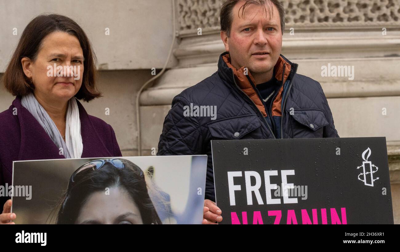 London, UK. 26th Oct, 2021. Richard Ratcliffe, husband of imprisoned Nazanin Zaghari-Ratcliffe, on hunger strike for her release outside the Foreign and Commonwealth Office Catherine West Shadow foreign office minster (left) with Richard Ratcliffe, UK Credit: Ian Davidson/Alamy Live News Stock Photo