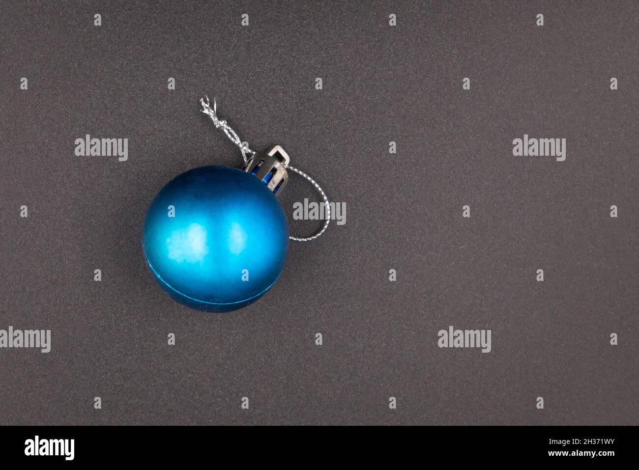 blue christmas ball isolated on black background Stock Photo