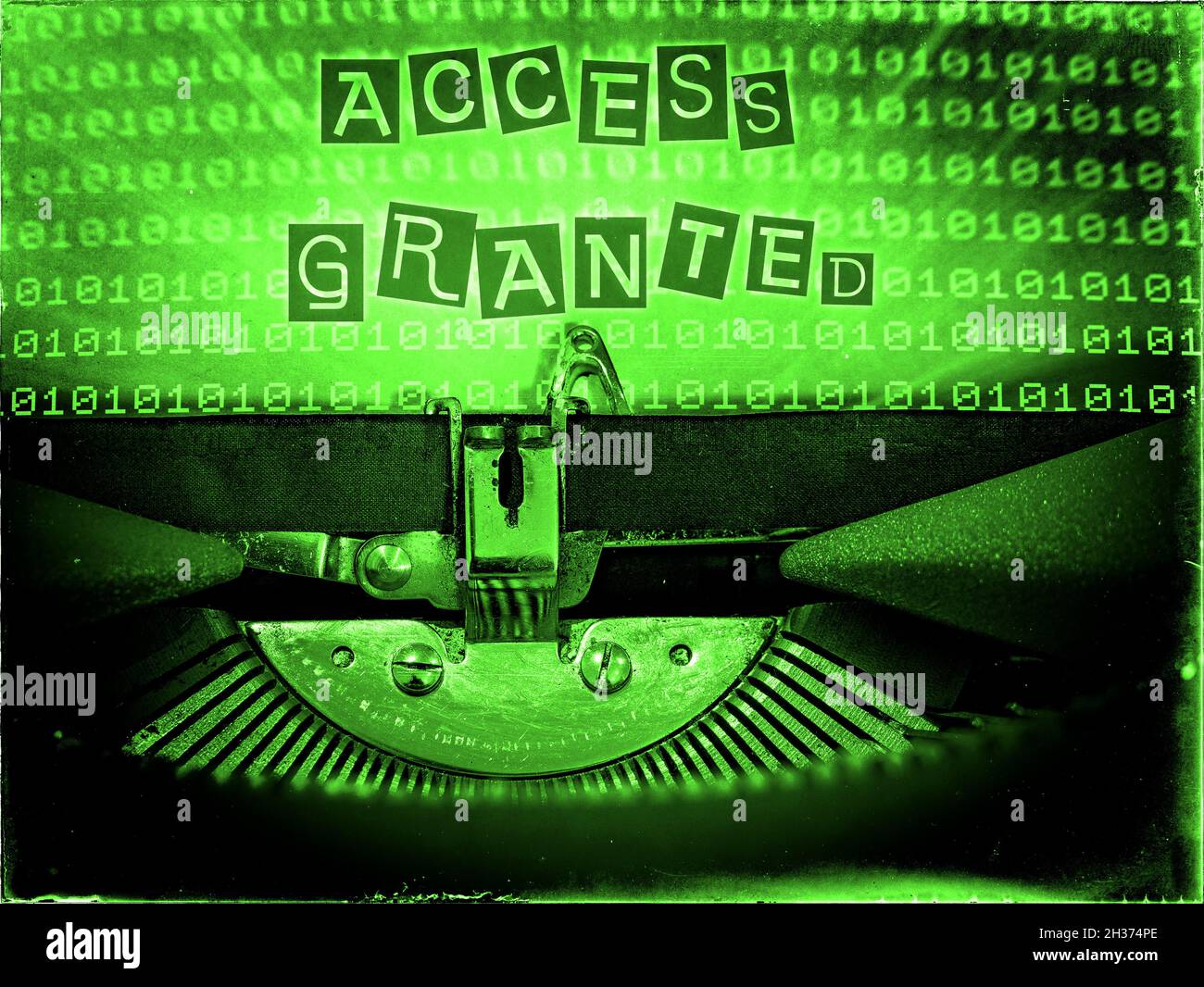 Access Granted displayed on a vintage typewriter in a green tone Stock Photo