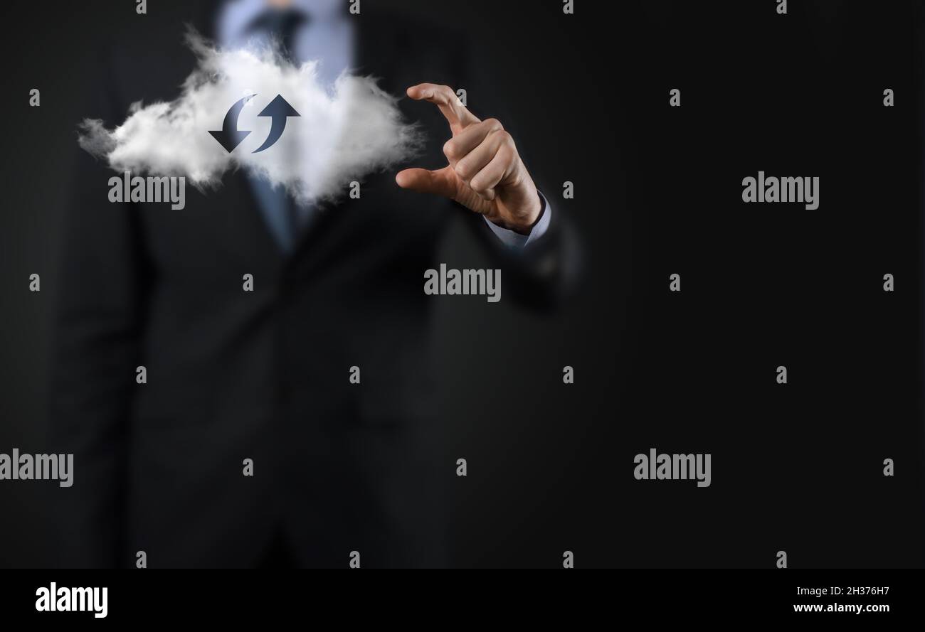Cloud technology. Polygonal wireframe cloud storage sign with two arrows up and down on dark . Cloud computing, big data center, future infrastructure Stock Photo