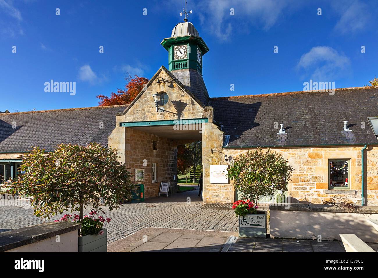 LOGIE STEADING FORRES MORAY SCOTLAND THE COURTYARD AND ENTRANCE UNDER THE CLOCK TOWER Stock Photo