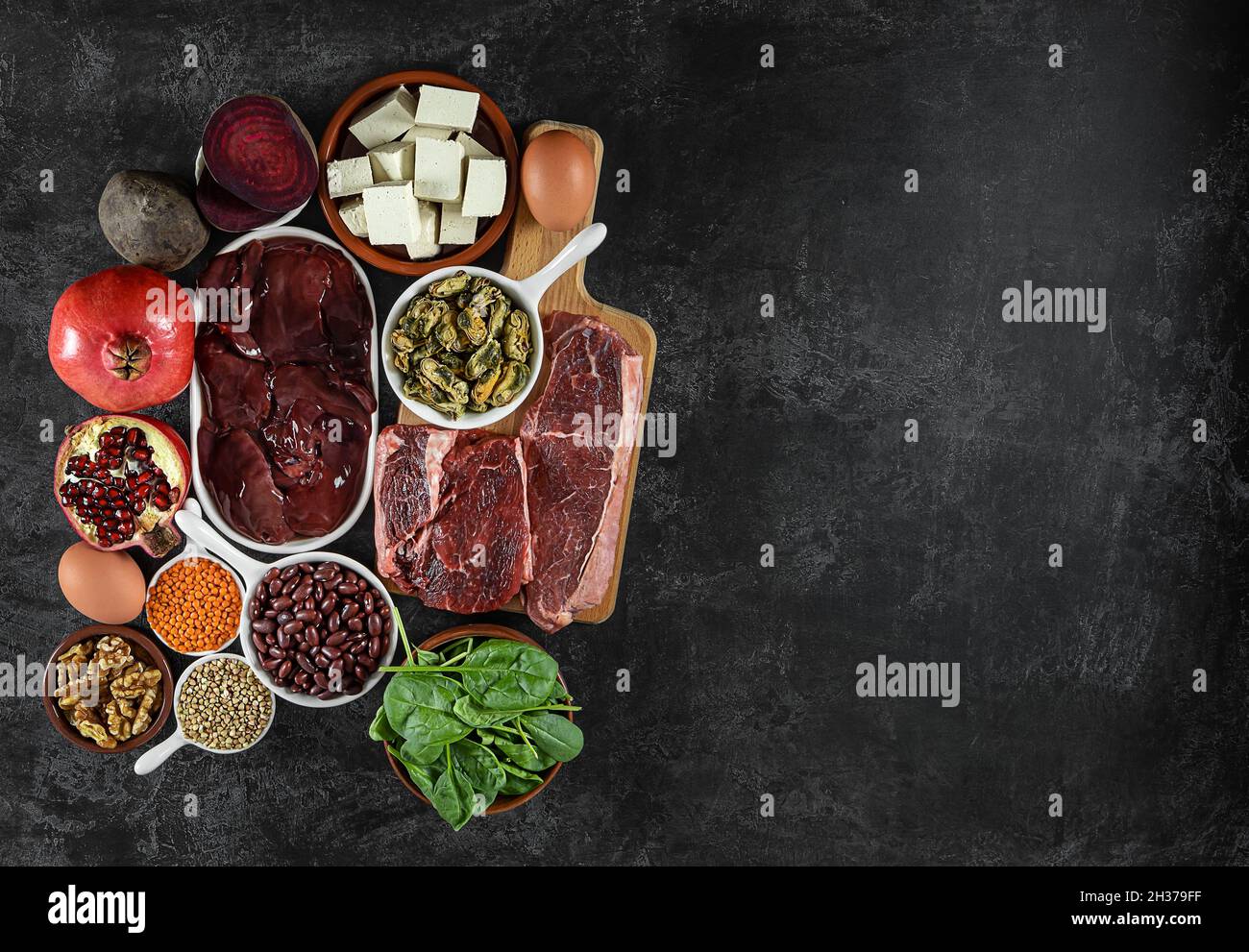 Foods high in Iron, including eggs, nuts, spinach, beans, tofu, liver