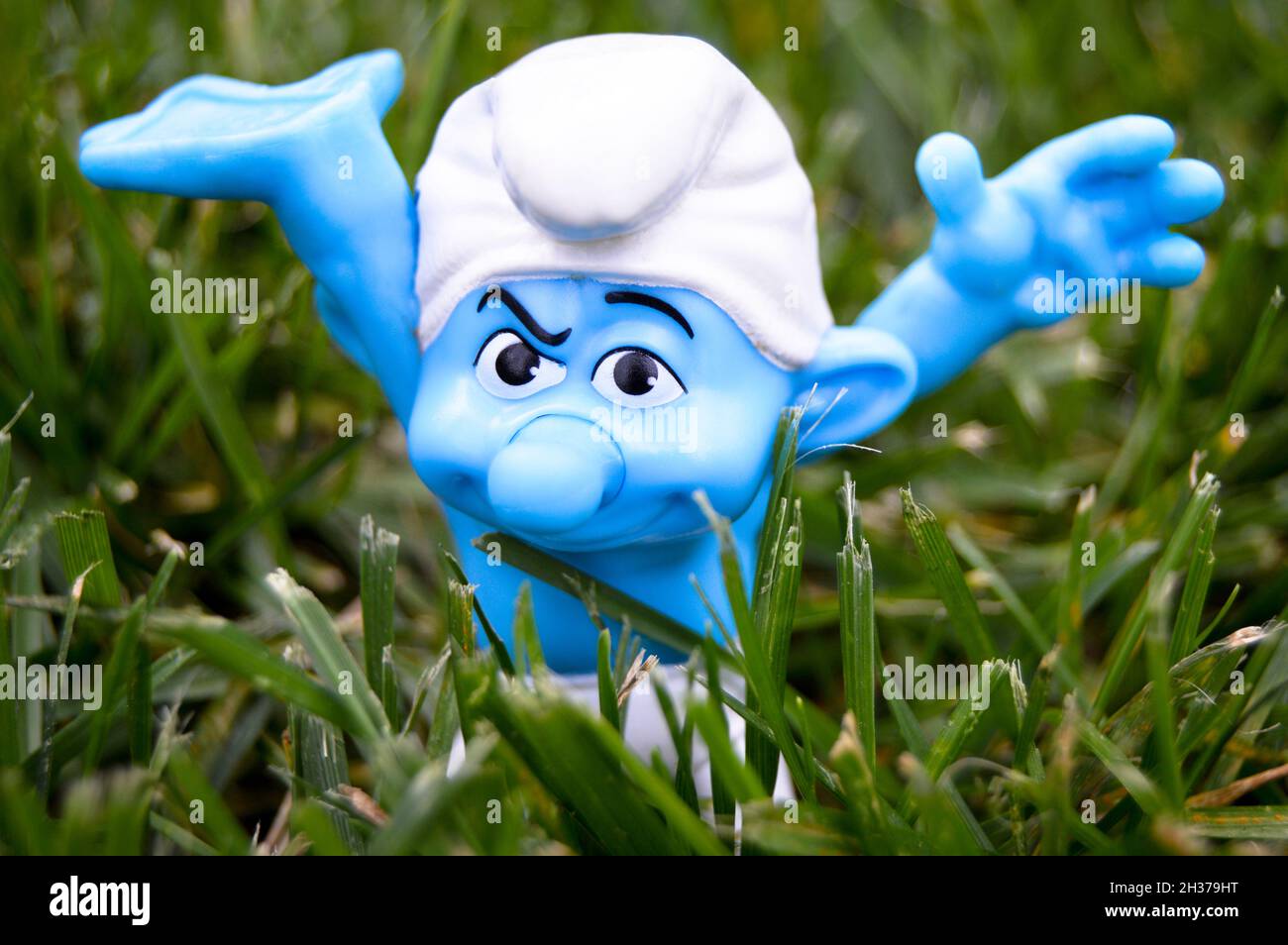 Famous cartoon character blue smurfs wandering in the magic forest, Istanbul Turkey Emirgan korusu, April 20 2014 Stock Photo