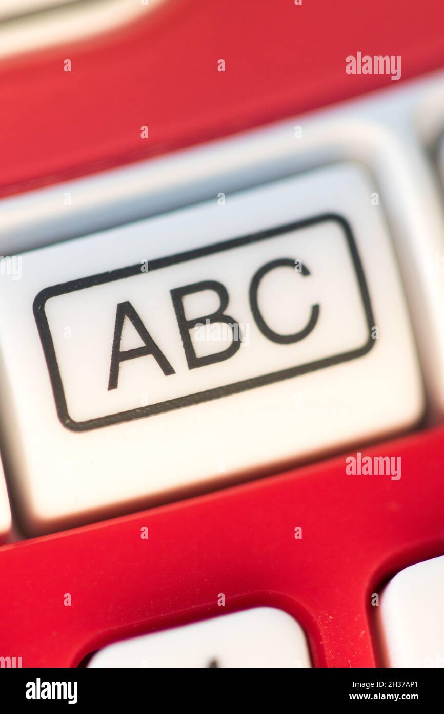 ABC letters on a button of an electronic device Stock Photo