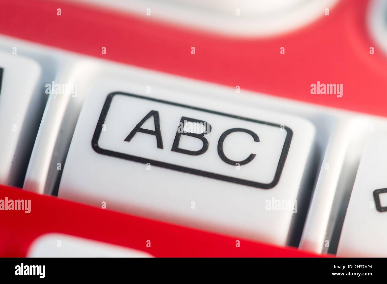 ABC letters on a button of an electronic device Stock Photo