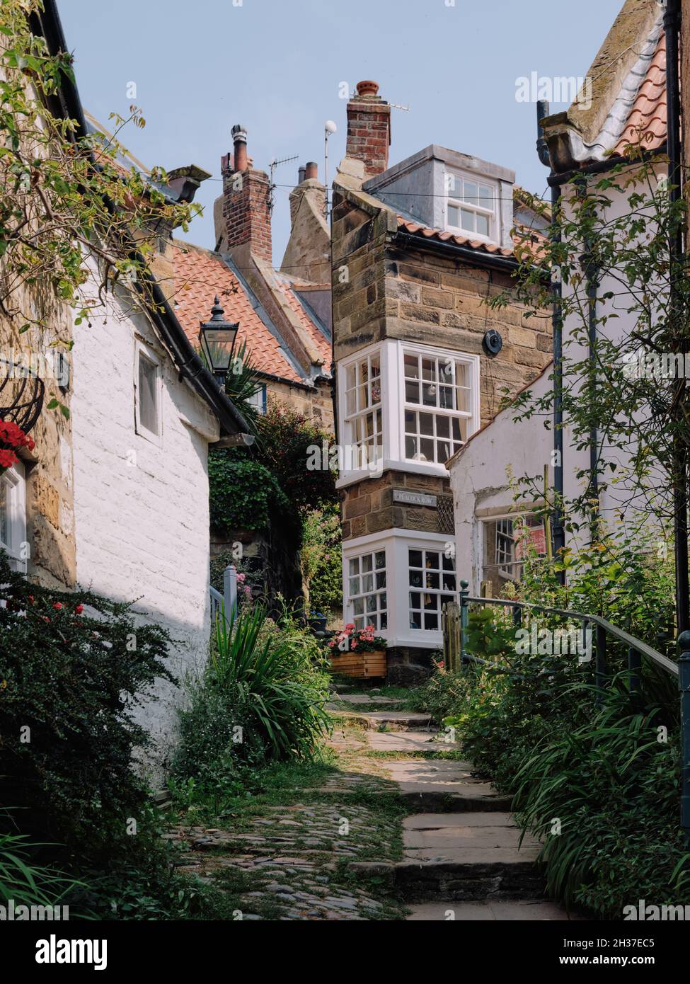 the-narrow-picturesque-street-paths-and-stone-terraced-cottages-of