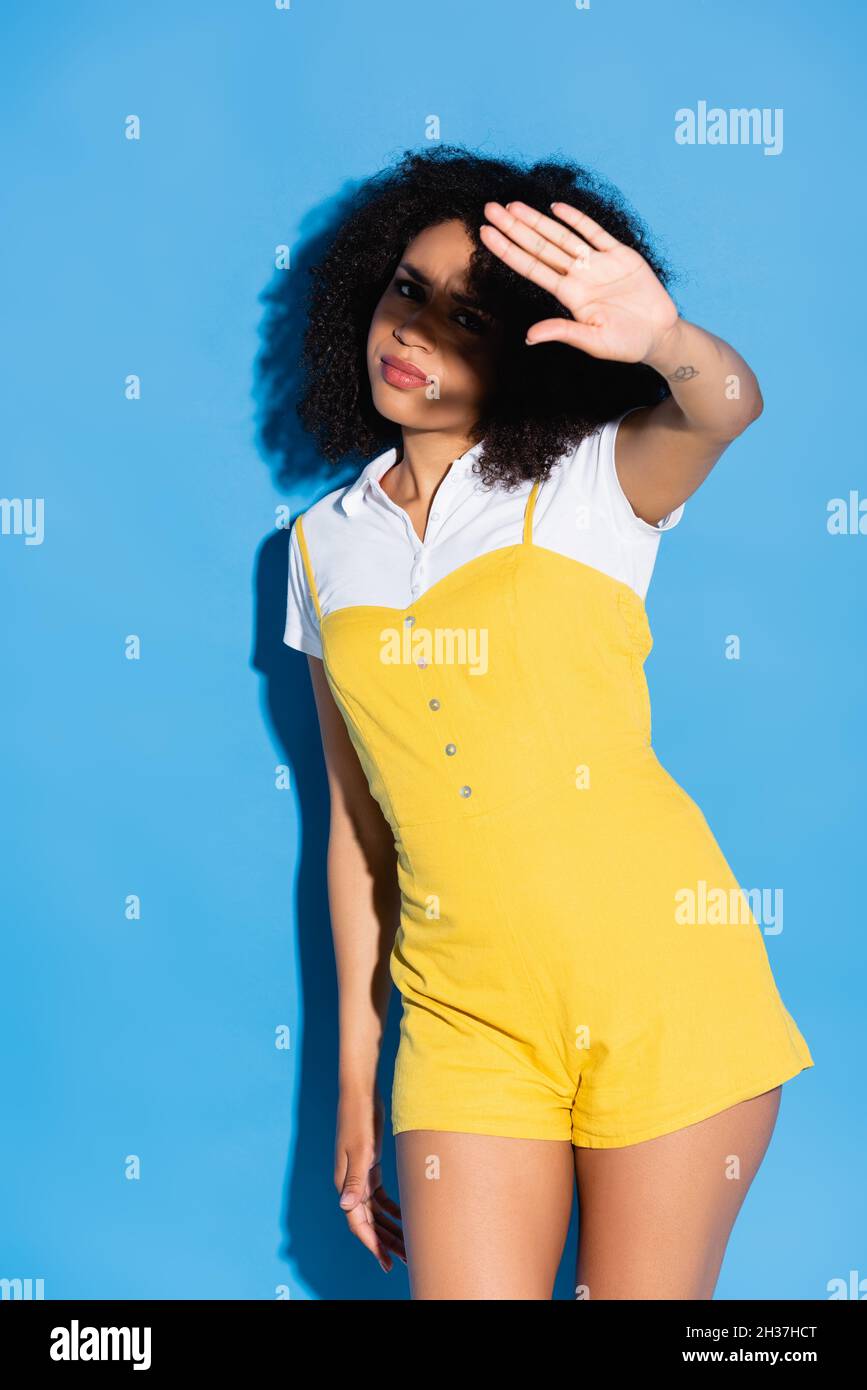 Young african woman stop sign hi-res stock photography and images - Alamy
